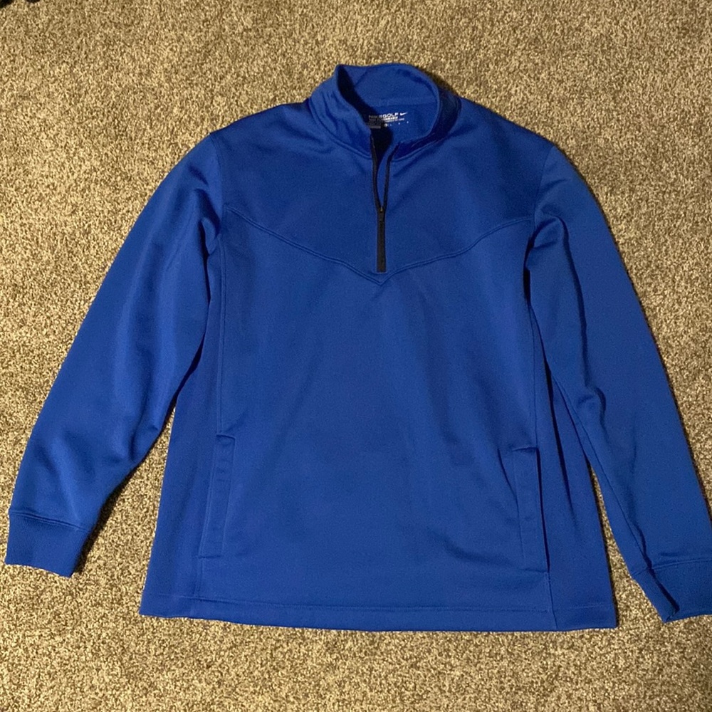 Blue large Nike half zip golf pullover.